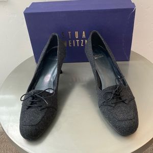 Stuart Weitzman Gray flannel women’s 2” pumps.